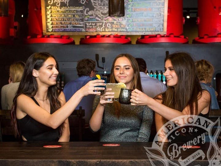 Girls having a drink at American Icon Brewery